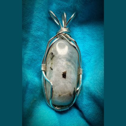 Wire-wrapped monochrome crystal pendant